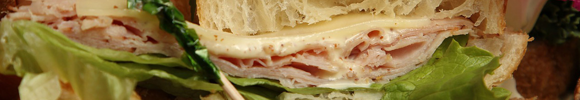 Eating Deli Sandwich at B J Sandwich Shop restaurant in Budd Lake, NJ.